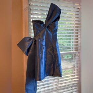 Fancy mini dress with a huge bow detail
